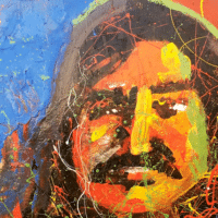 A portrait of Leonard Peltier at the entrance of Oceti Sakowin Camp, 2016.